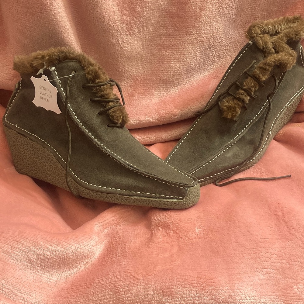 Brown suede bootie. Size 10. Never been worn. Wedge heel.